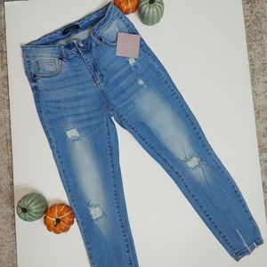 Distressed skinny denim jeans
